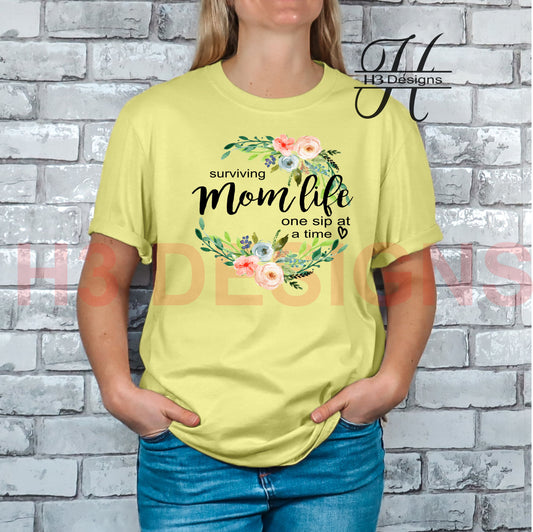 Surviving Mom Life one Sip at a time tee